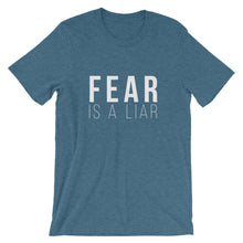 The next level of you is on the other side.  Fear Is A Liar T-Shirt - Worthy Human